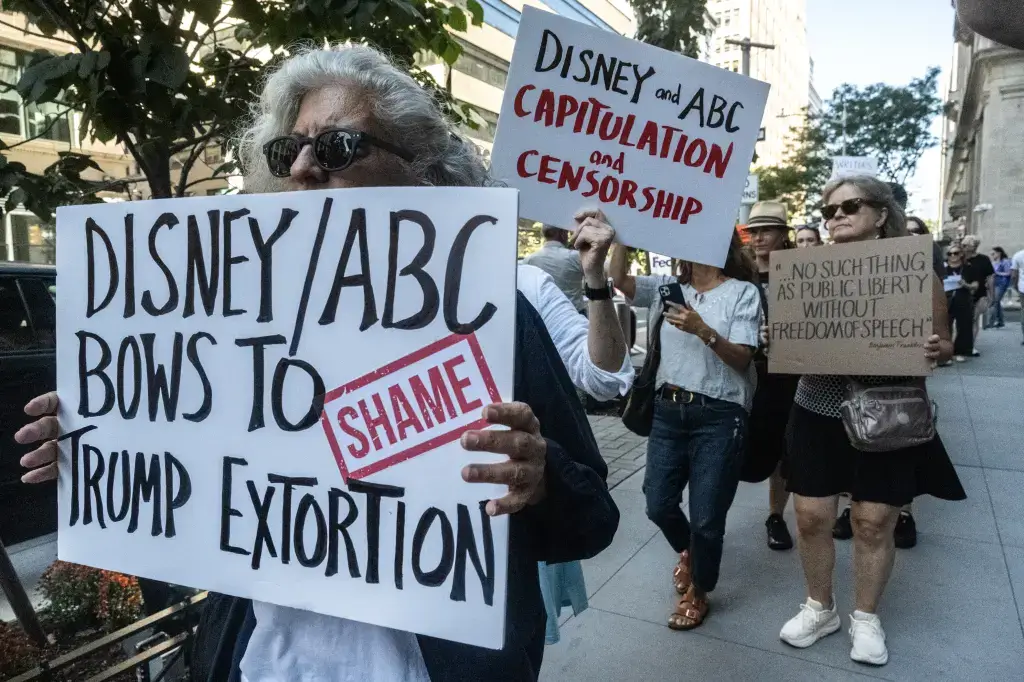 In New York City, people take part in a demonstration organized by the WGA in response to ABC's decision to suspend Jimmy Kimmel from his late-night program.